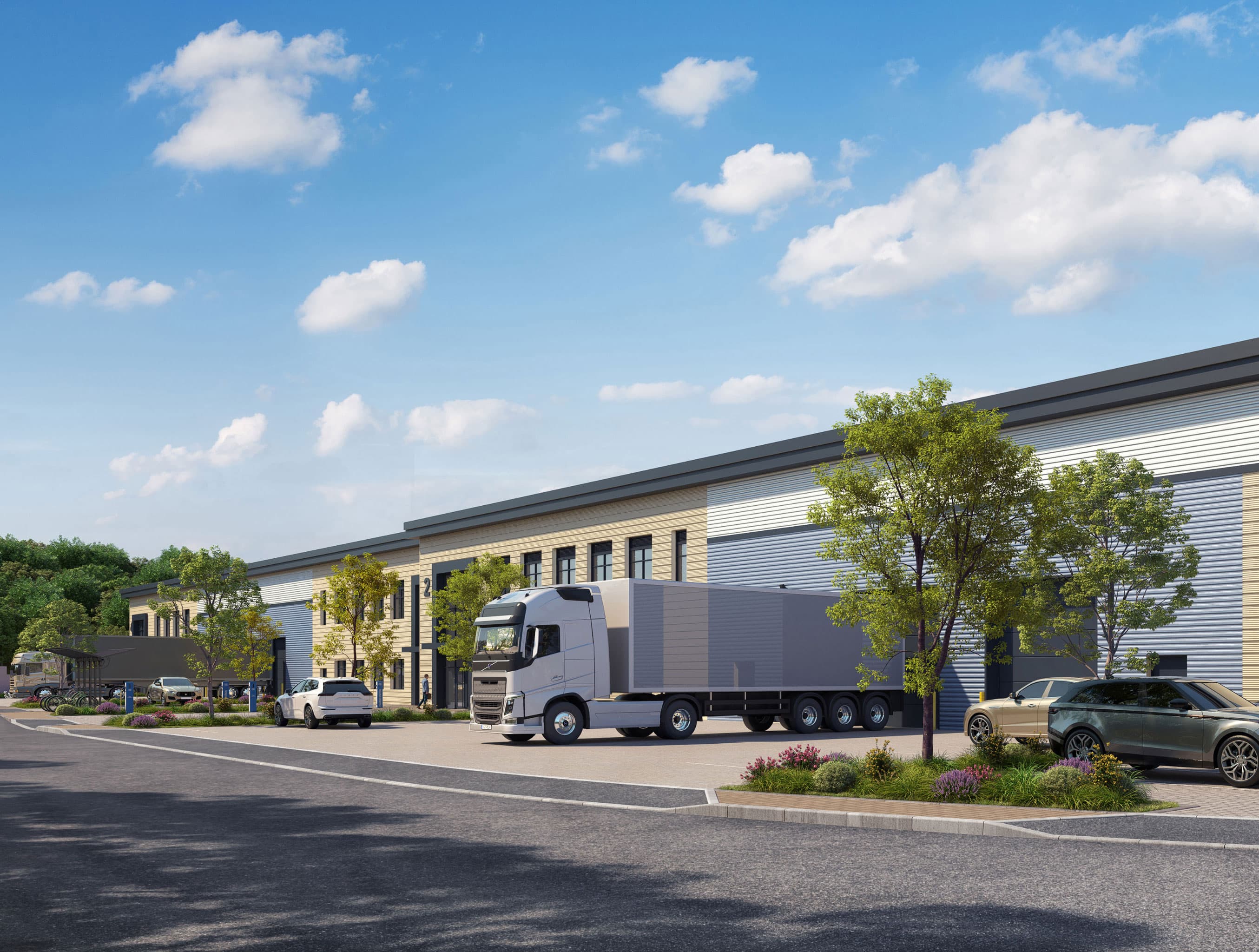 A modern two-storey office building with landscaped grounds on an industrial estate
